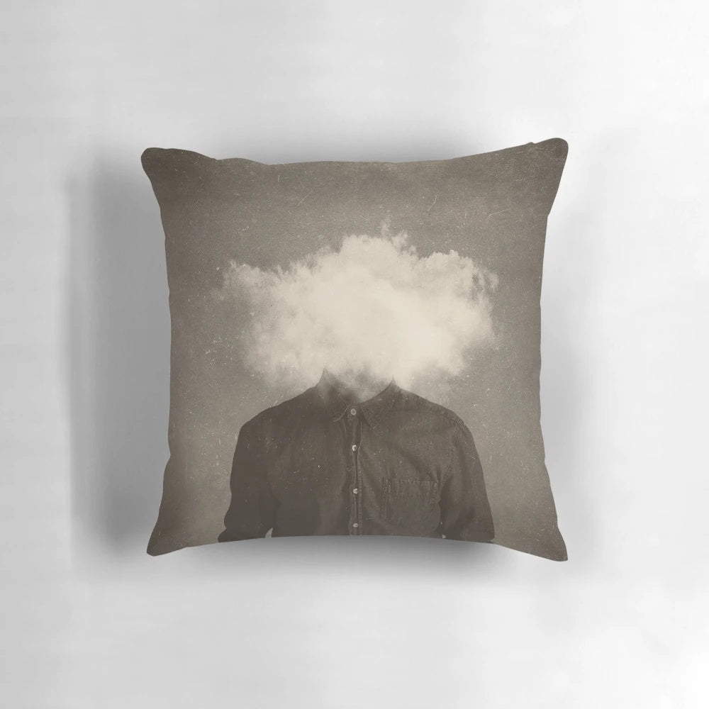 Surreal, abstract pillow featuring a headless figure in a foggy, smoke-filled environment