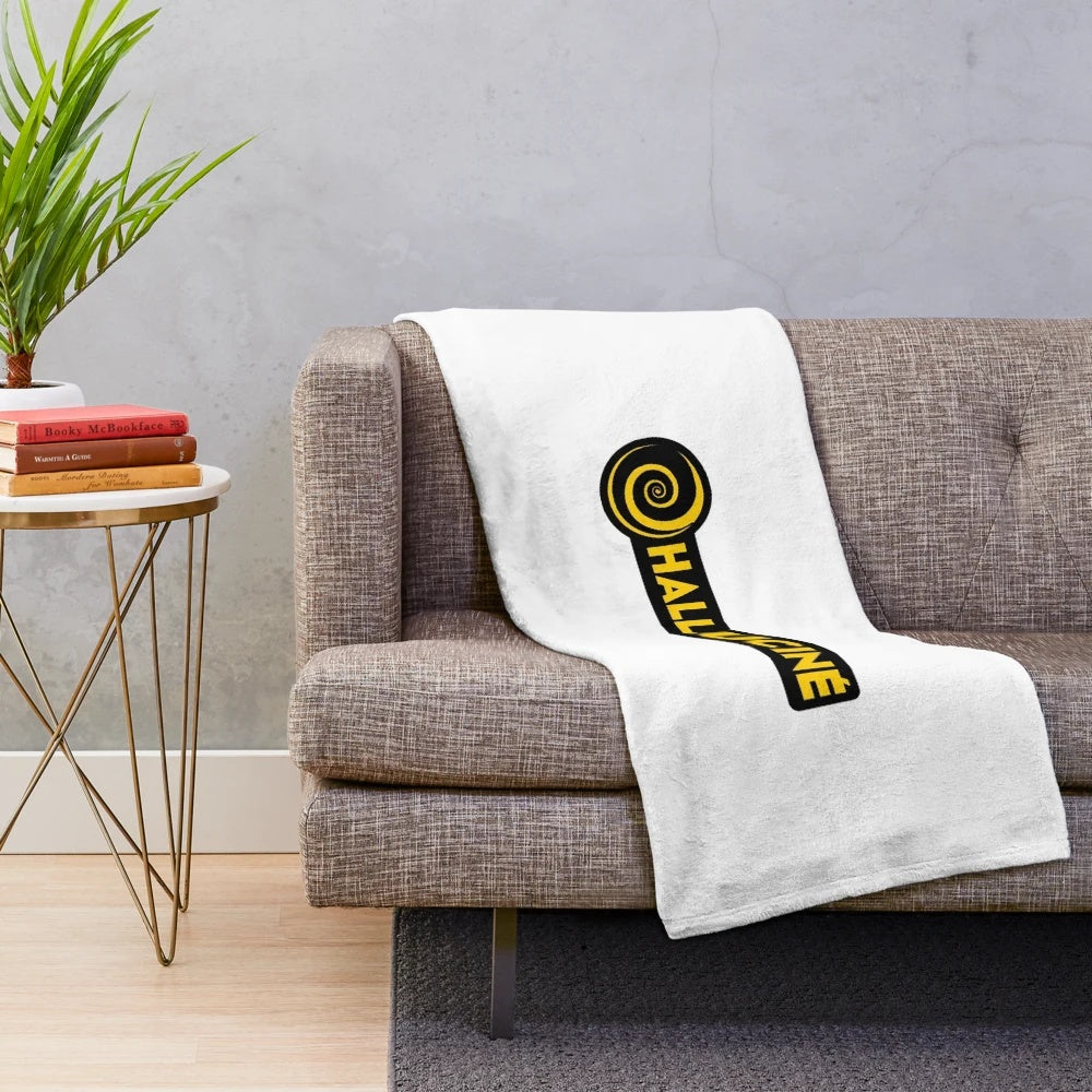 Plush blanket with abstract, psychedelic design evoking cinema, dreams, and altered states of mind
