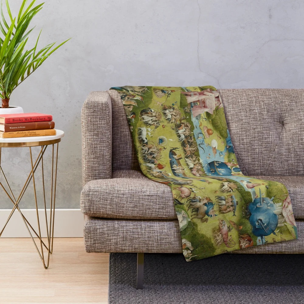 Plush blanket featuring surreal and psychedelic artwork inspired by Hieronymus Bosch's famous painting