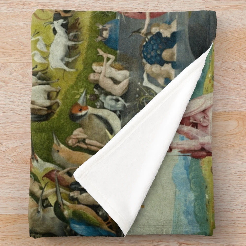 Plush blanket featuring surreal and psychedelic artwork inspired by Hieronymus Bosch's famous painting