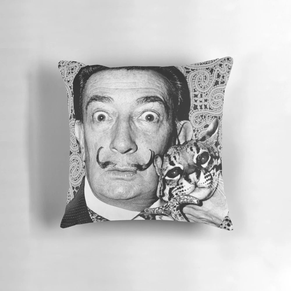 Surreal black and white image of Salvador Dali's cat on a decorative pillow