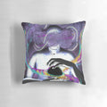 Pillow featuring a surreal space scene with a spaceman holding a black hole in their hands, against a colorful, nebula-like background.