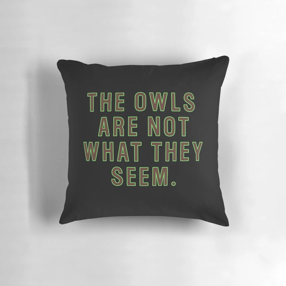 A colorful and surreal graphic pillow inspired by the cult TV series Twin Peaks, featuring abstract elements and references to the show's iconic characters and locations.