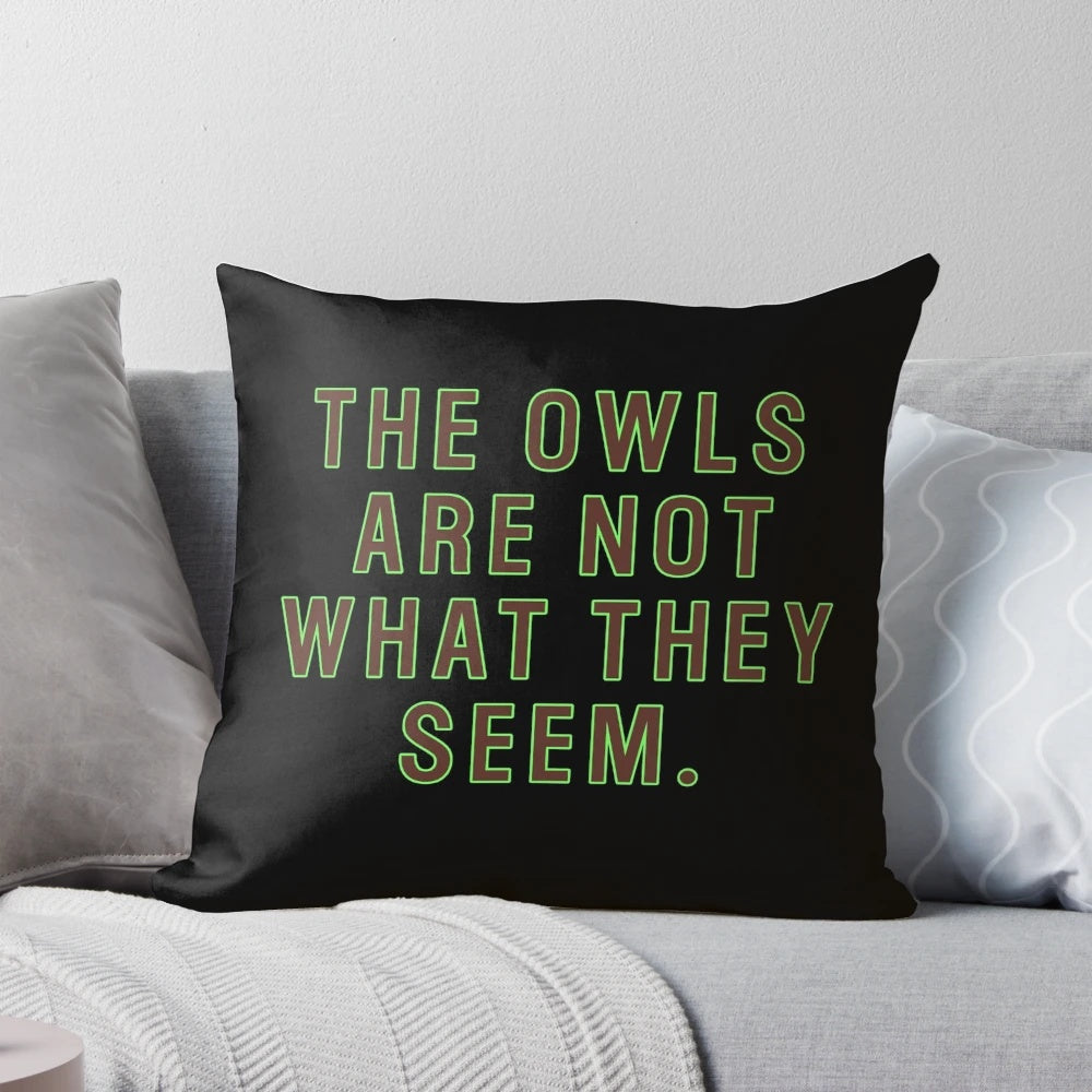 A colorful and surreal graphic pillow inspired by the cult TV series Twin Peaks, featuring abstract elements and references to the show's iconic characters and locations.