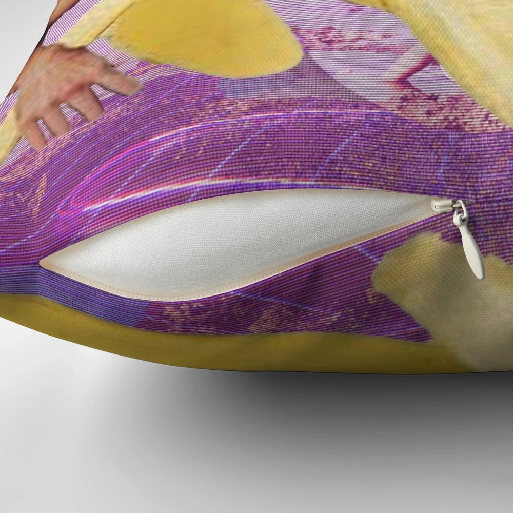A digital art-style pillow featuring an image of Nicholas Cage's face over a pink and blue vaporwave-inspired background with bananas.