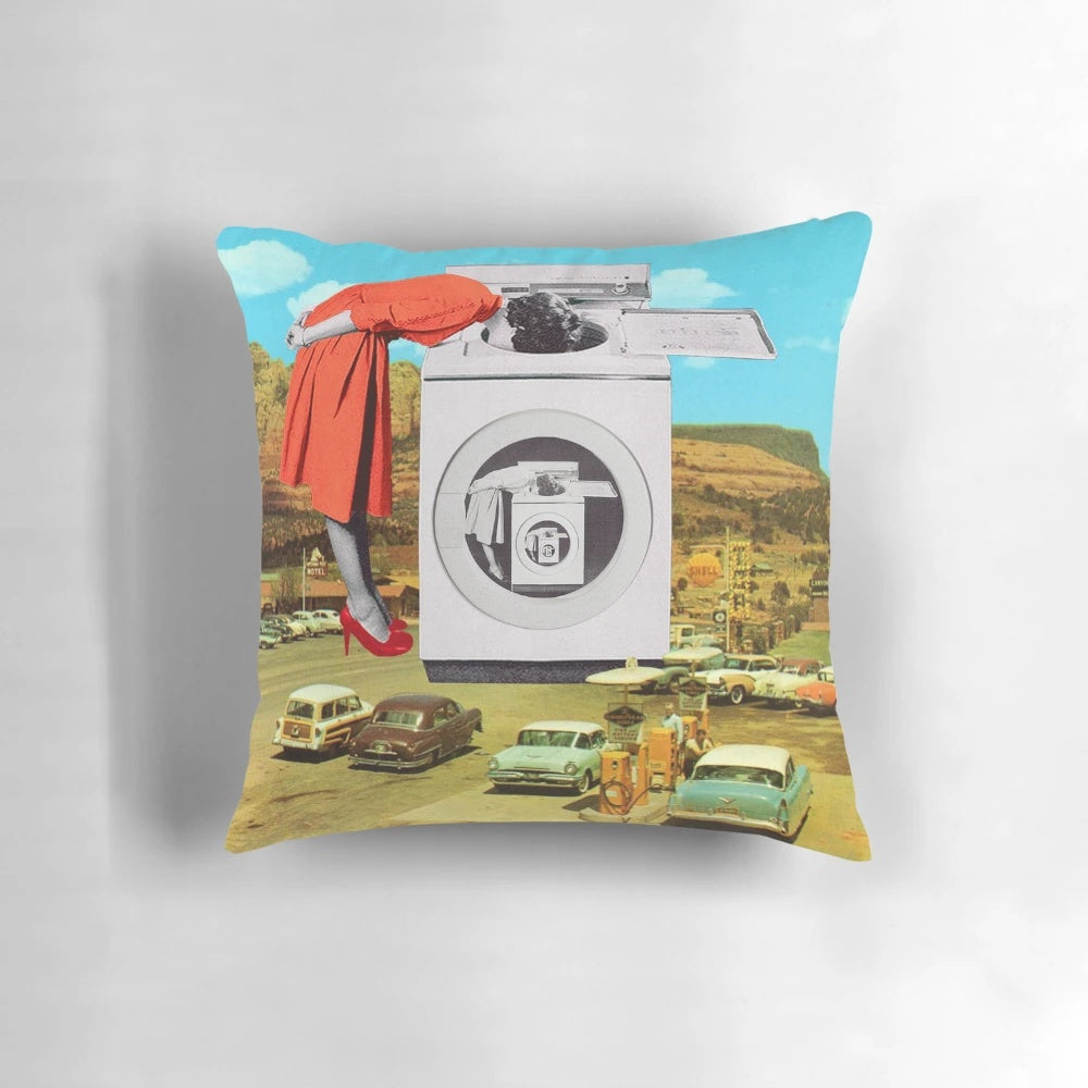 A surreal, colorful collage art pillow depicting a watching machine or robot figure.
