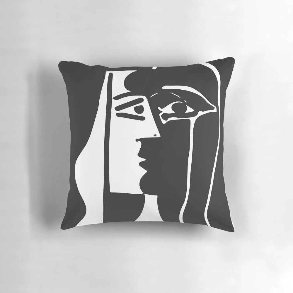 Surrealist black and white throw pillow featuring abstract art inspired by the visionary paintings of Spanish artist Joan Miro.