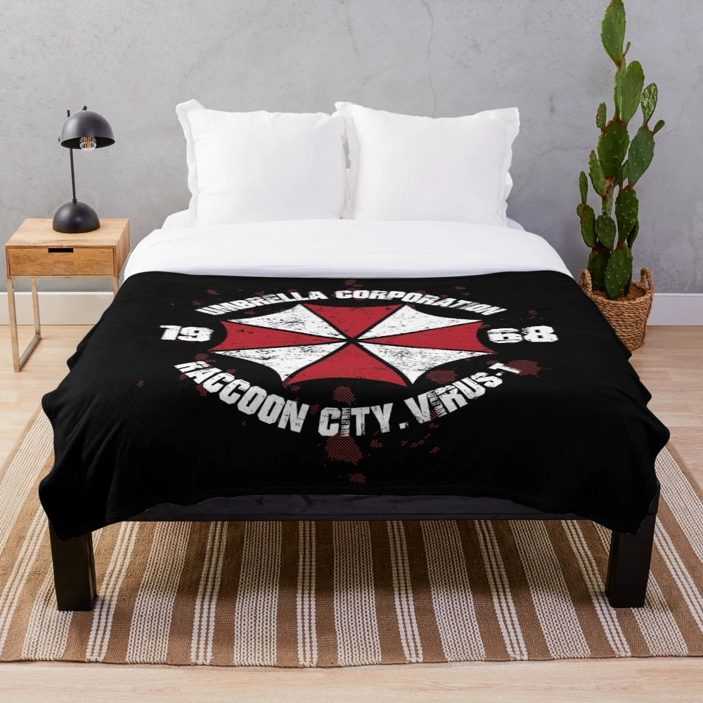 Plush blanket with Umbrella Corporation logo from horror video game