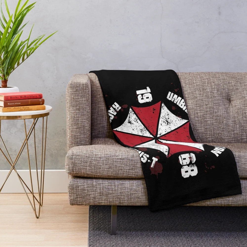 Plush blanket with Umbrella Corporation logo from horror video game