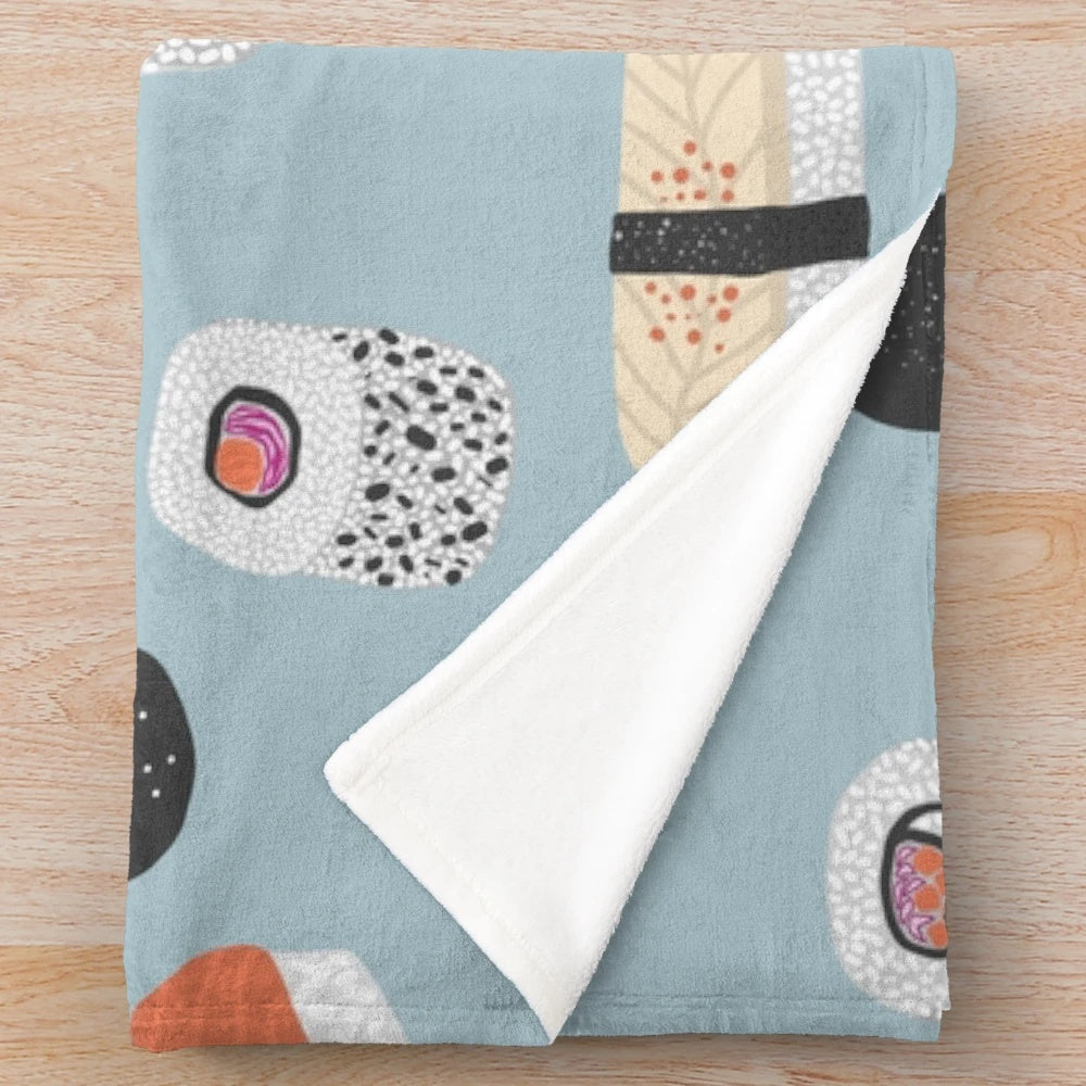 Sushi-themed plush blanket with detailed Japanese food art design