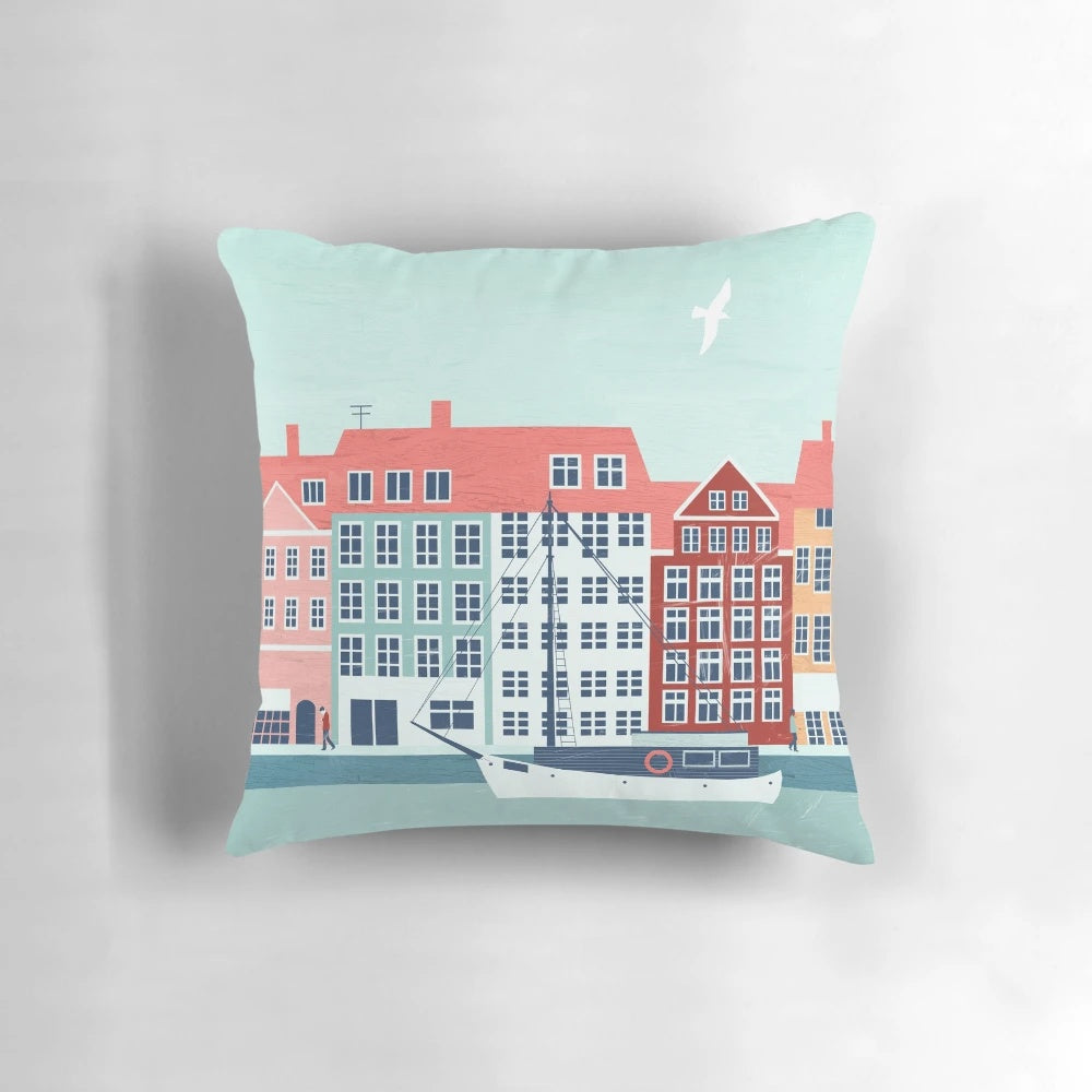Vibrant Copenhagen travel poster design featured on a soft, eco-friendly pillow