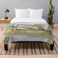 Swaledale sheep on Stanton Moor in a watercolor-style photograph printed on a plush blanket