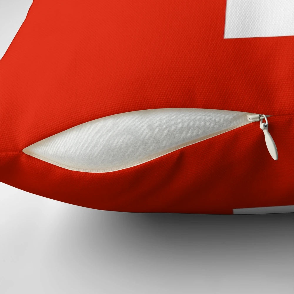 Swiss flag themed decorative pillow with the iconic Swiss cross symbol