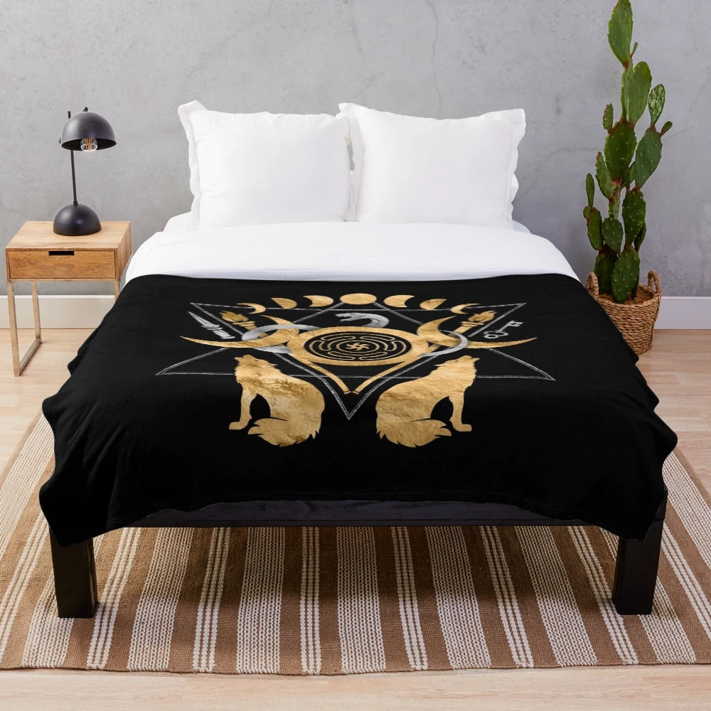 Plush blanket featuring the symbols of the Greek goddess Hecate, including the wheel, torches, and triple moon.