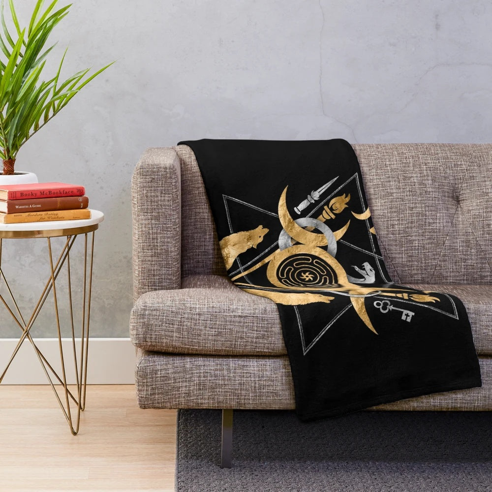 Plush blanket featuring the symbols of the Greek goddess Hecate, including the wheel, torches, and triple moon.