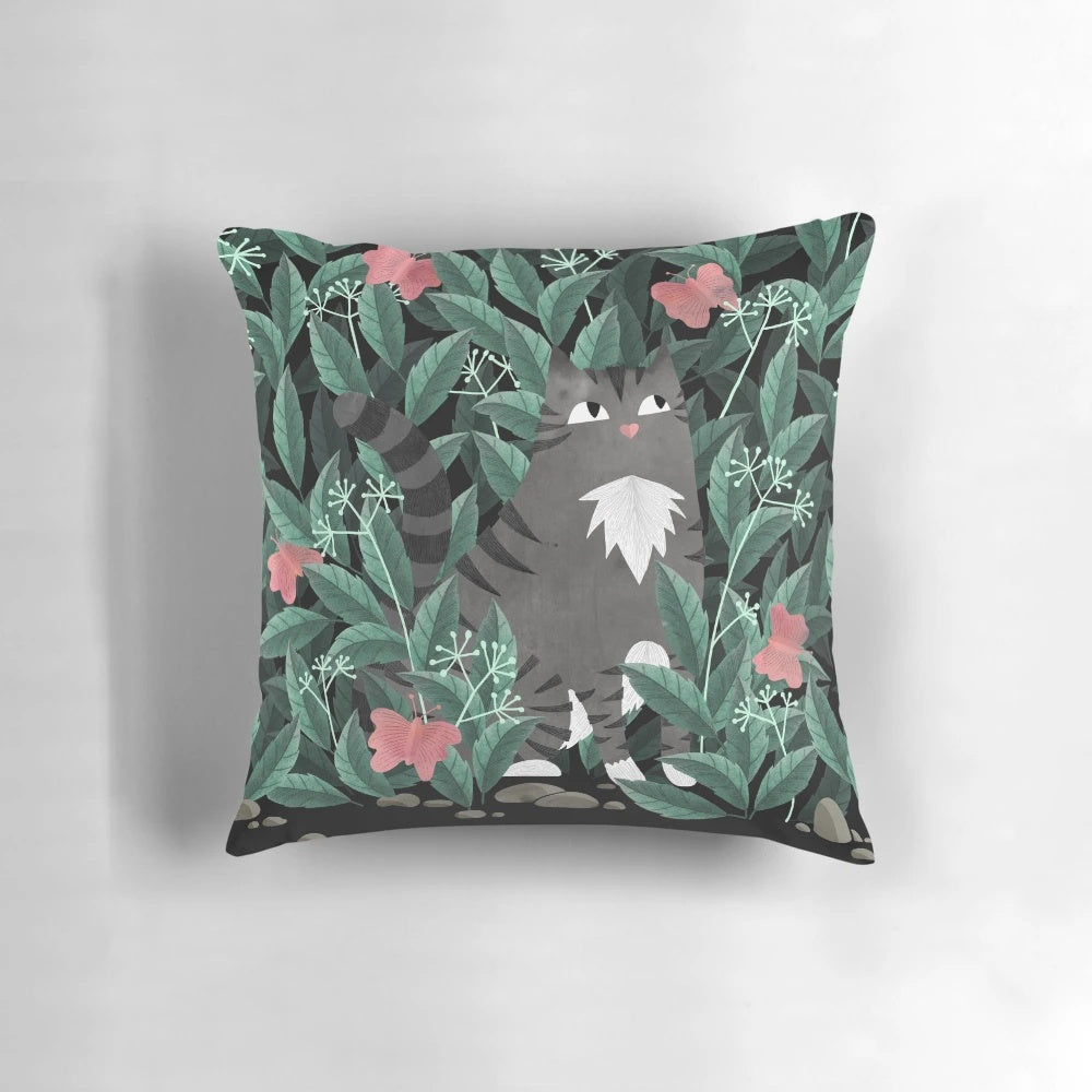 Tabby cat pillow with a lush, jungle-inspired butterfly garden design