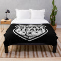 Tactical shield-inspired plush blanket with a distressed, grunge design