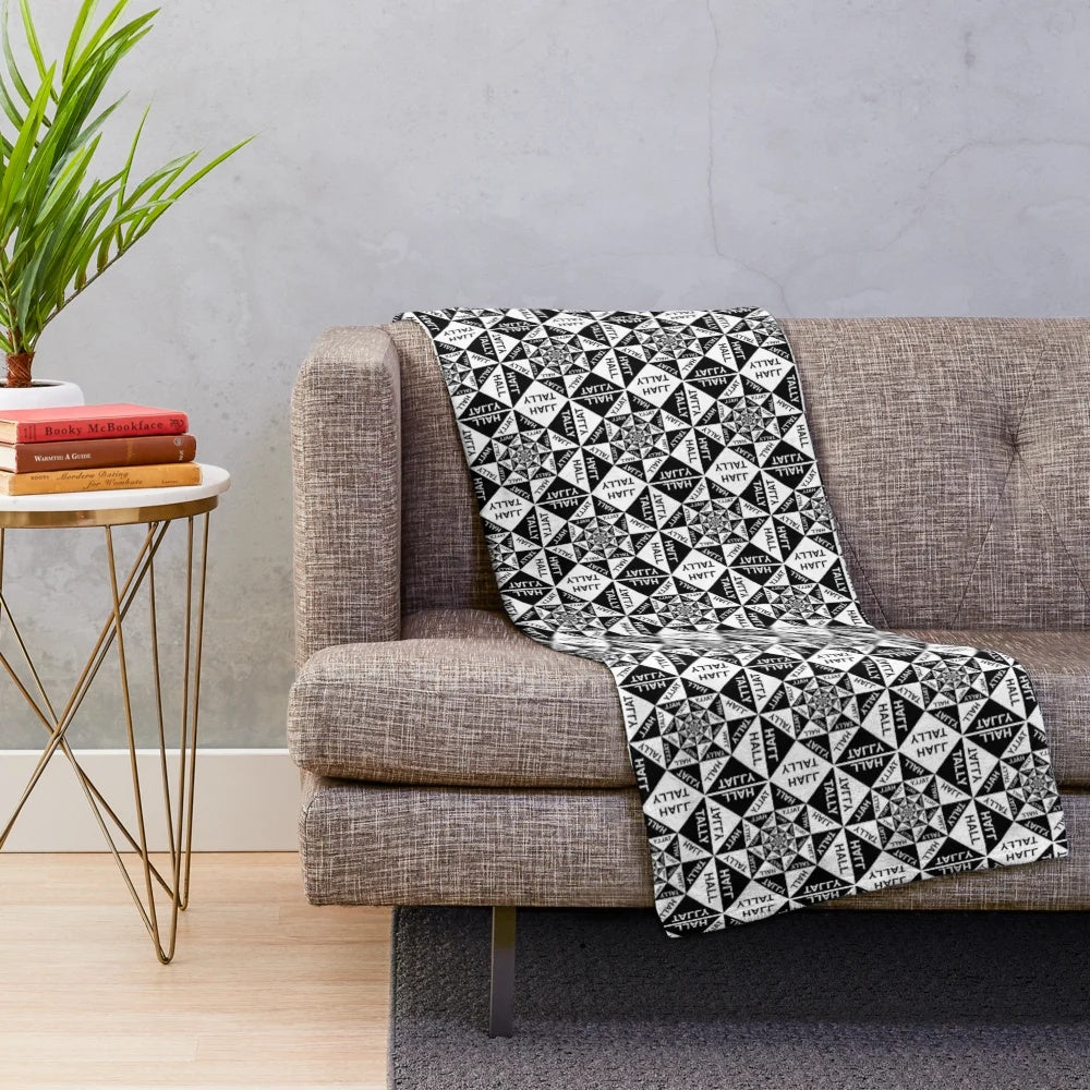 Tally Hall plush blanket with band logo and tropical imagery