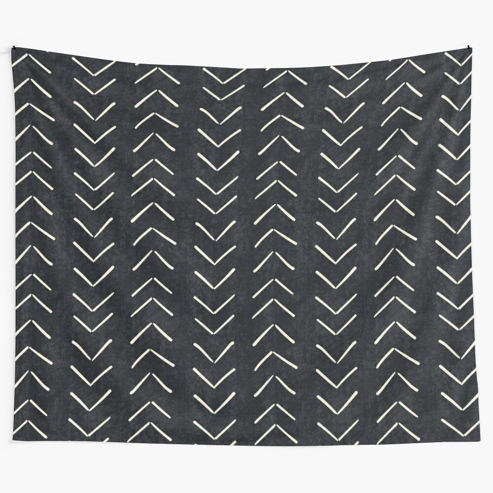 Boho geometric black and white tapestry with repeating arrow pattern