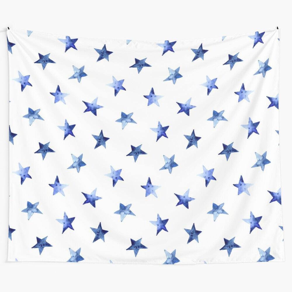 Starry watercolor tapestry with a galaxy and cosmic design