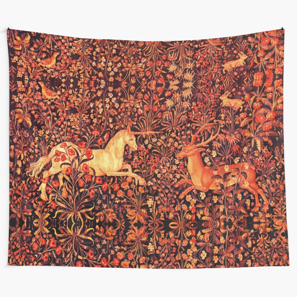 Floral tapestry with unicorn, deer, and other forest animals