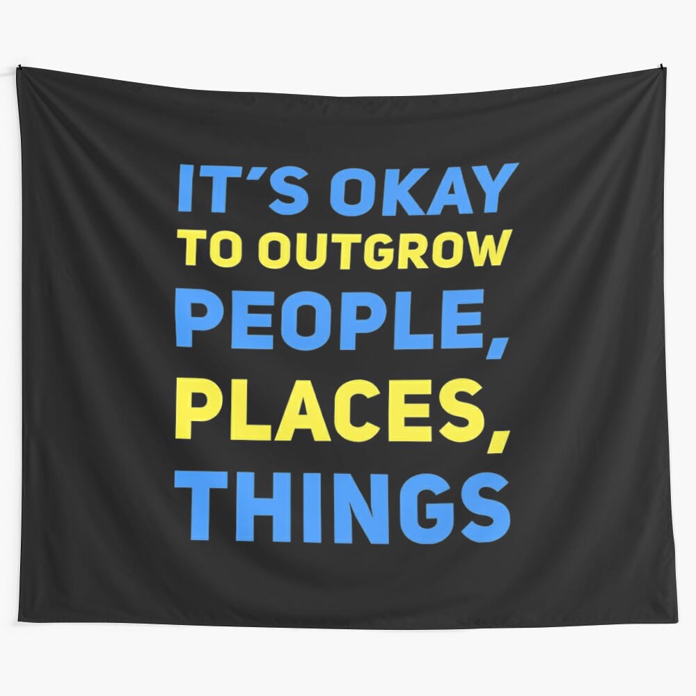 Inspirational tapestry with the text "It's Okay to Outgrow People, Places, and Things"