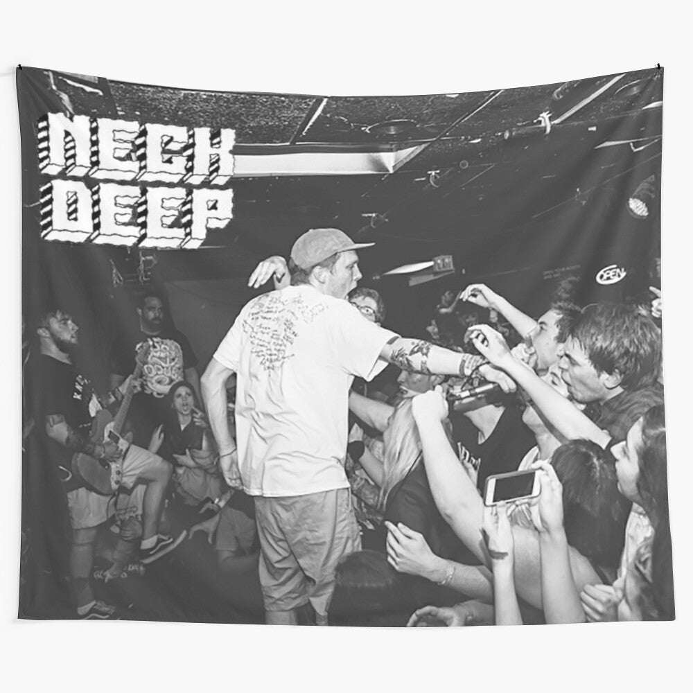 Neck Deep performing live on stage at a concert