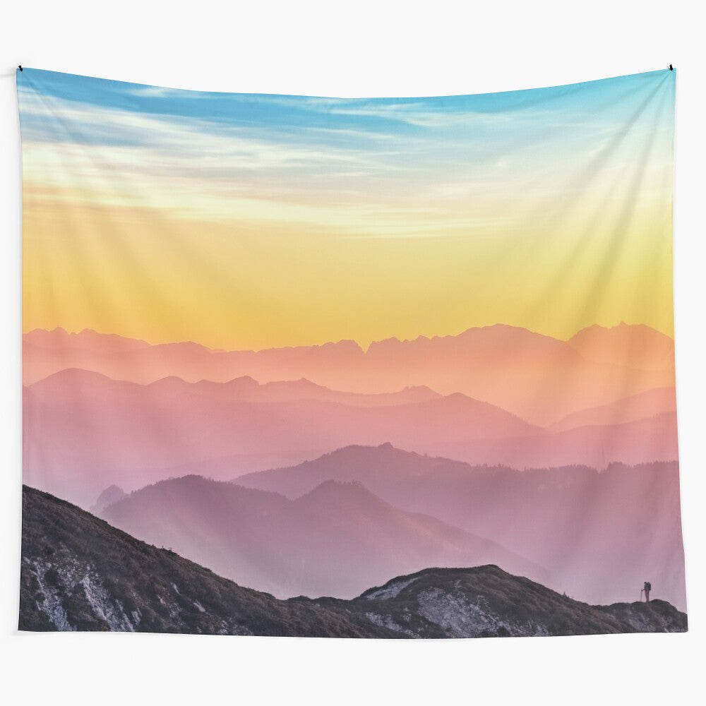 Pastel skies tapestry featuring a scenic landscape with mountains, ocean, and colorful clouds