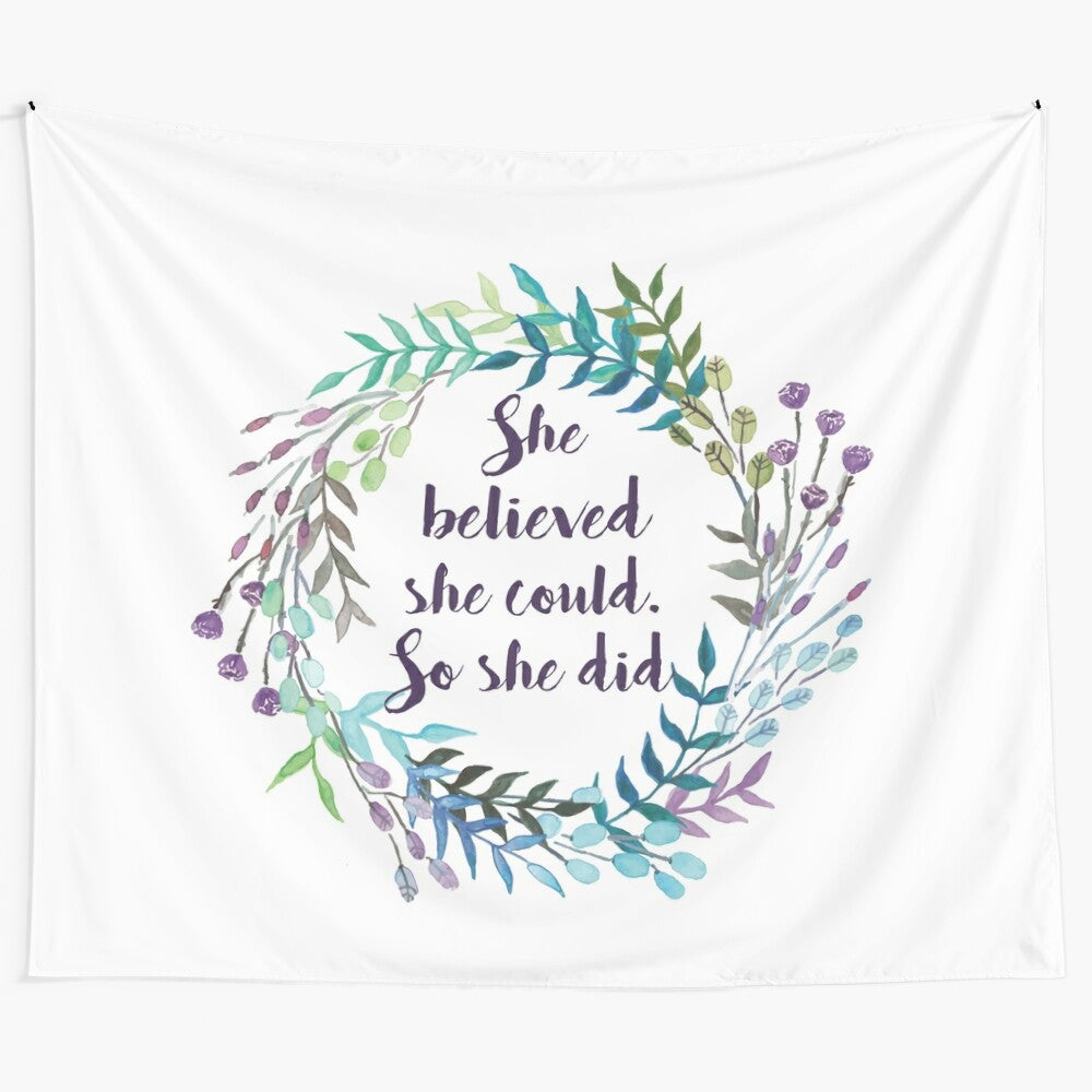 Floral tapestry design with inspirational quote "She Believed She Could, So She Did"