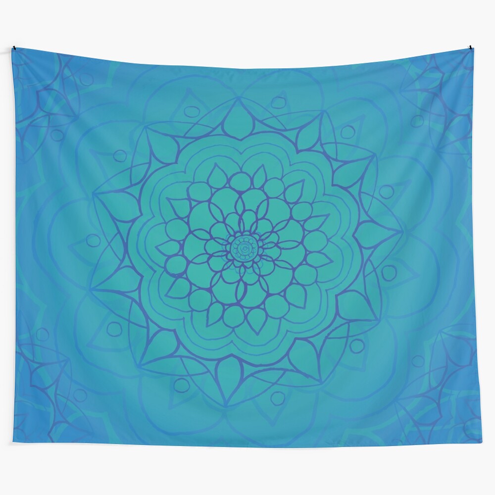 Handmade mandala wall tapestry featuring a blue and green watercolor design