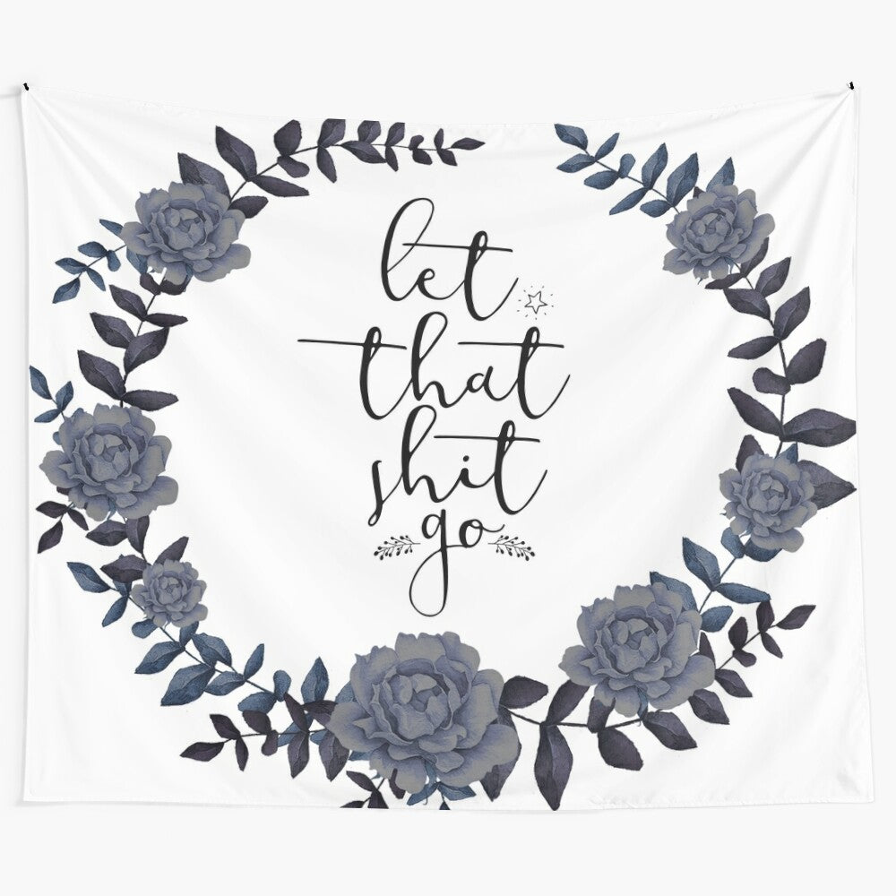 Inspirational tapestry with the text "Let That Shit Go" in a stylized typography design