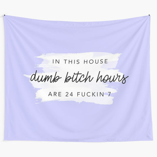 Violet purple tapestry with the text "In this house, dumb bitch hours are 24 fuckin 7"