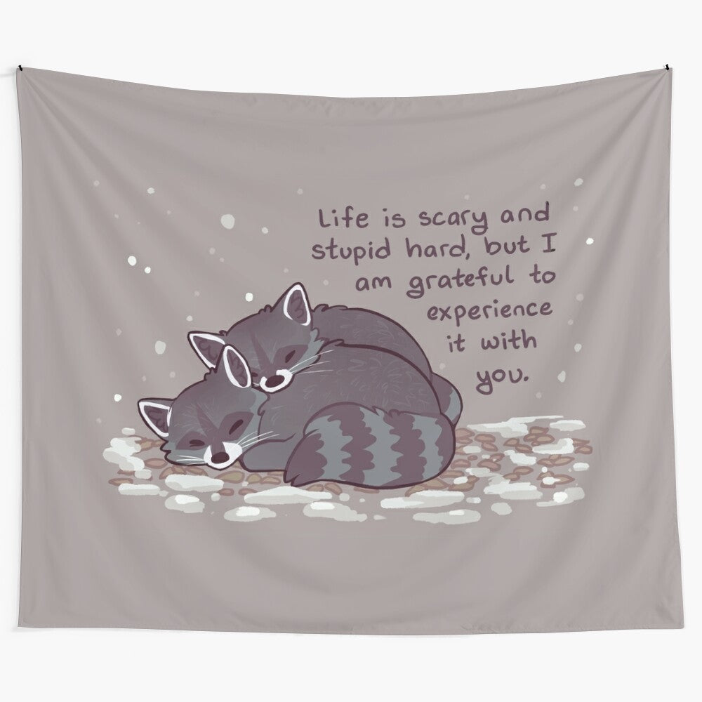 Snuggly raccoons cuddling in a snowy, winter scene on a soft, cozy tapestry