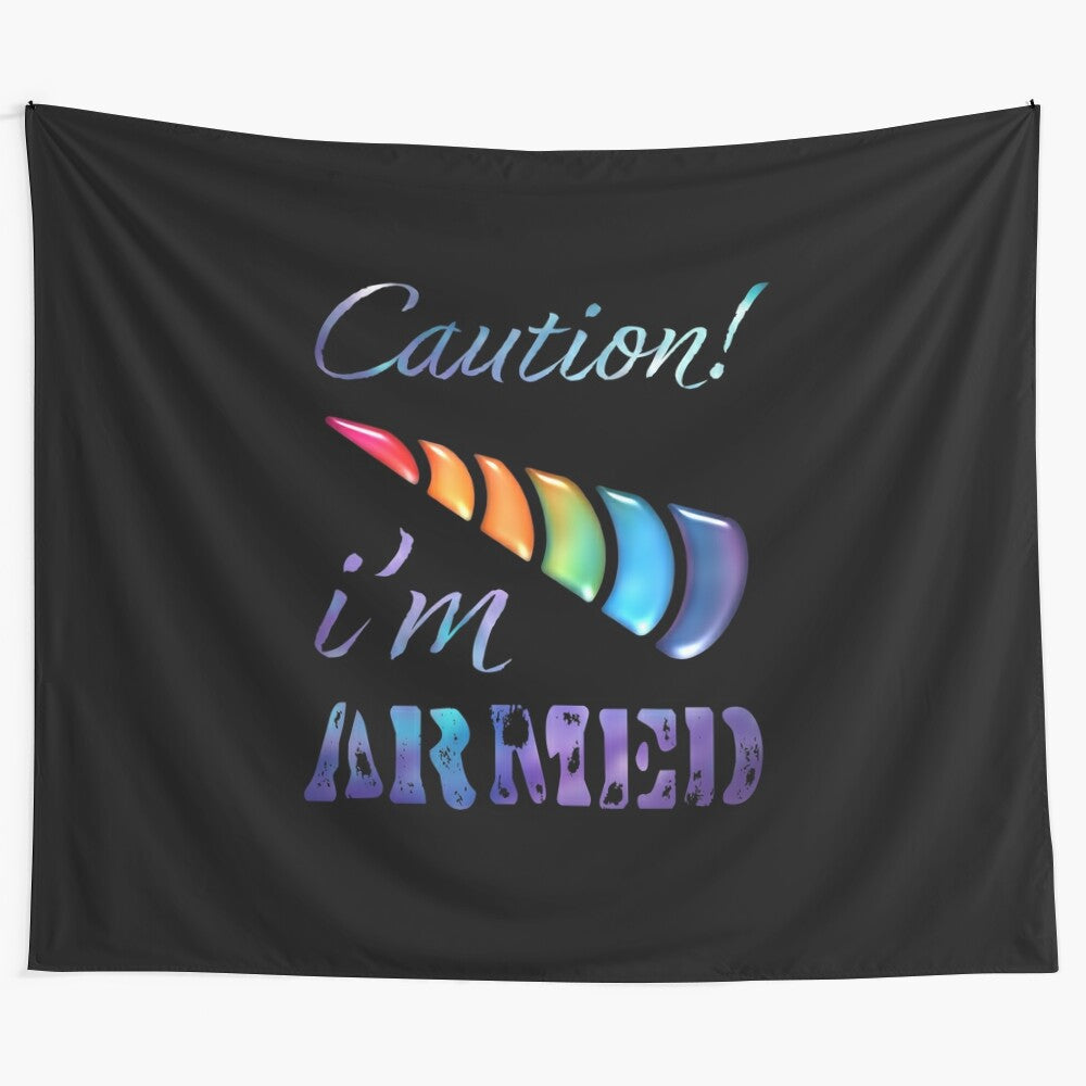 Colorful tapestry featuring a unicorn with a caution warning and an armed design