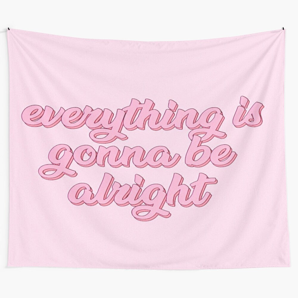 Motivational tapestry with pink and pastel colors featuring the phrase "Everything will be alright"