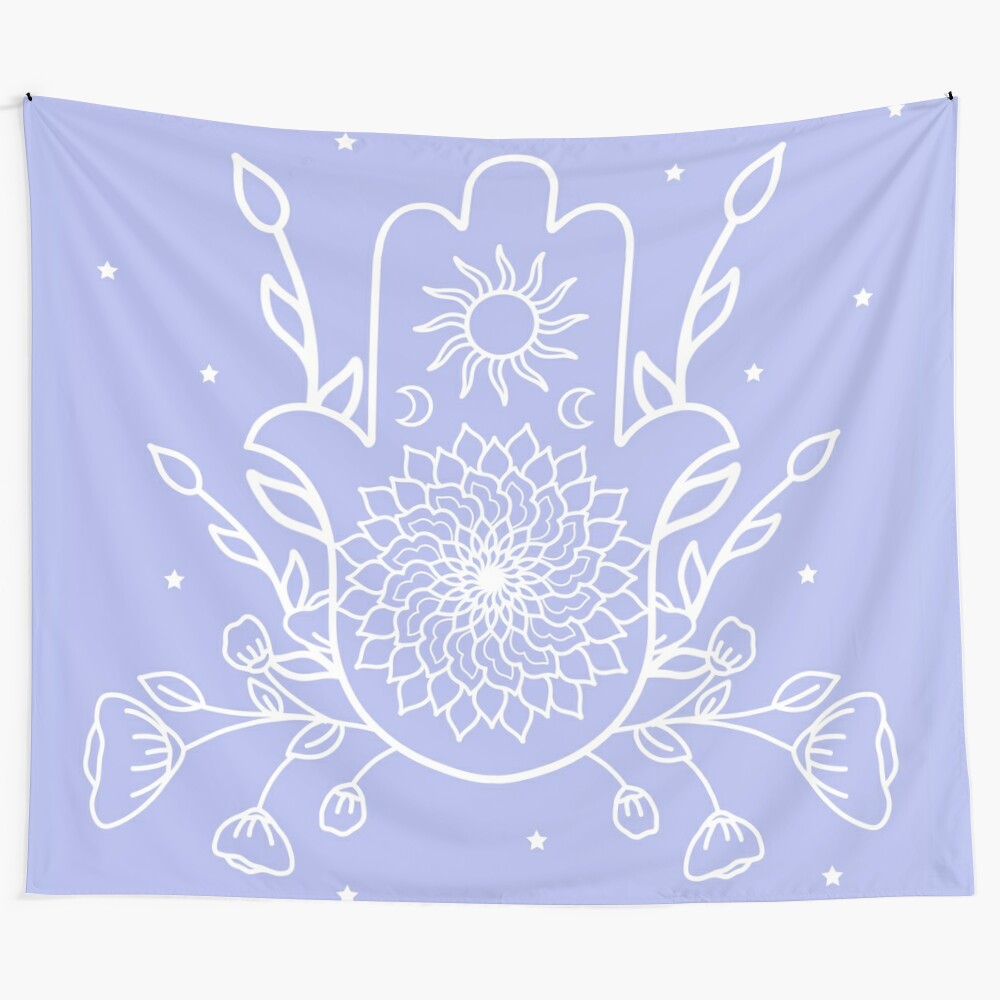 Detailed black and white hamsa hand tapestry with sun, moon, and floral design