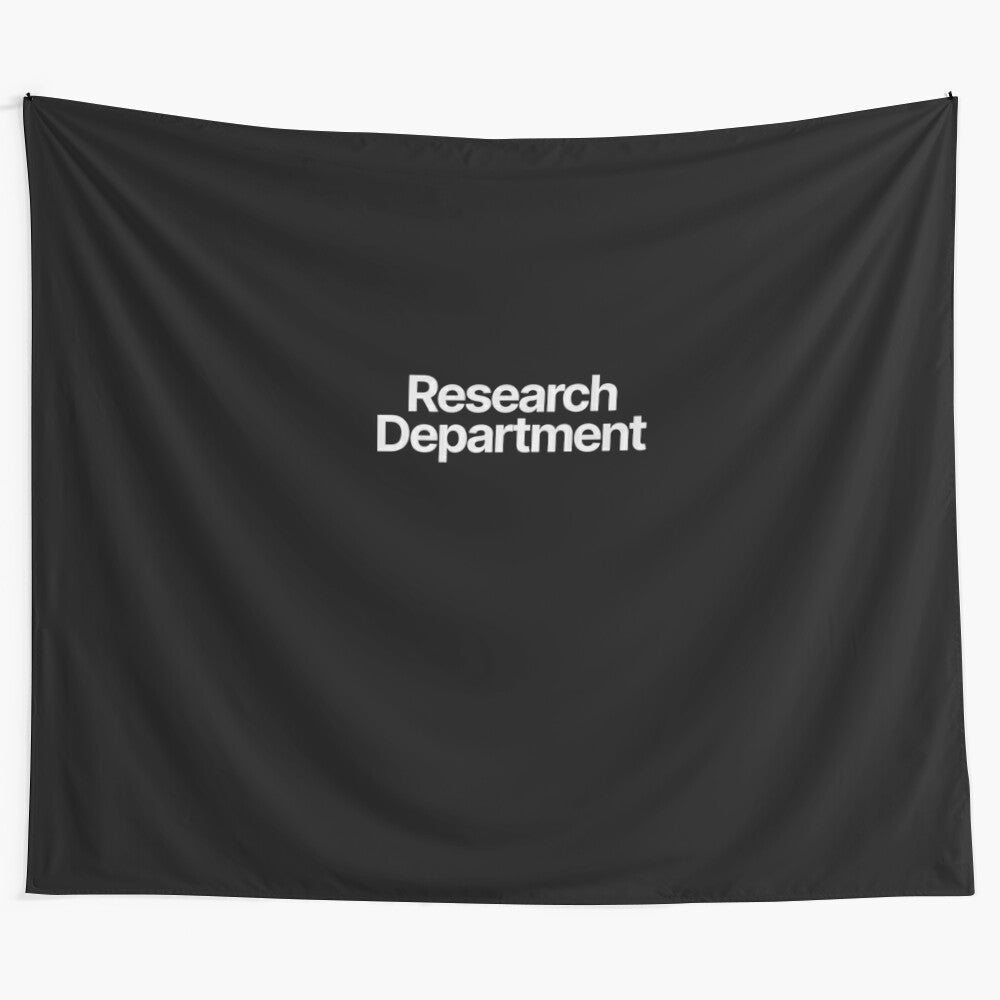 Colorful tapestry featuring research department-themed designs and illustrations