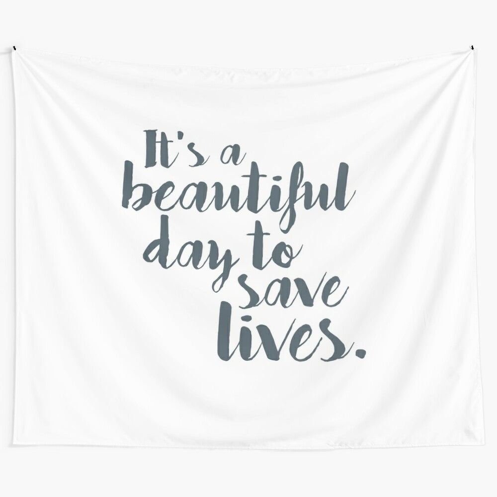 Handwritten "It's a Beautiful Day to Save Lives" tapestry design