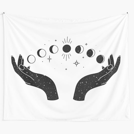 Cosmic boho tapestry with hands and moons design