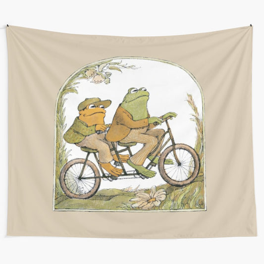 Whimsical tapestry featuring cartoon frogs and toads riding a bicycle in a nature-inspired setting