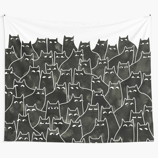 Whimsical black and white cat tapestry with a suspicious cat pattern