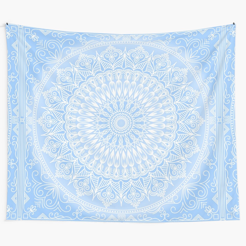 Blue mandala tapestry with floral design, perfect for boho-inspired spaces