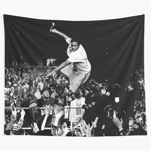 Black and white tapestry featuring crowd surfing and stage diving at a music concert