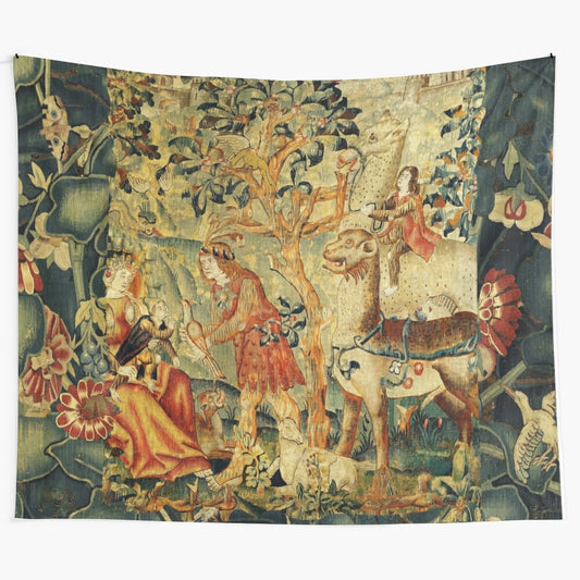 Antique floral tapestry featuring wild men, fantastic animals, and birds in a lush landscape