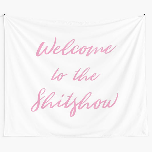 Colorful tapestry with the text "Welcome to the Shitshow" in cursive font