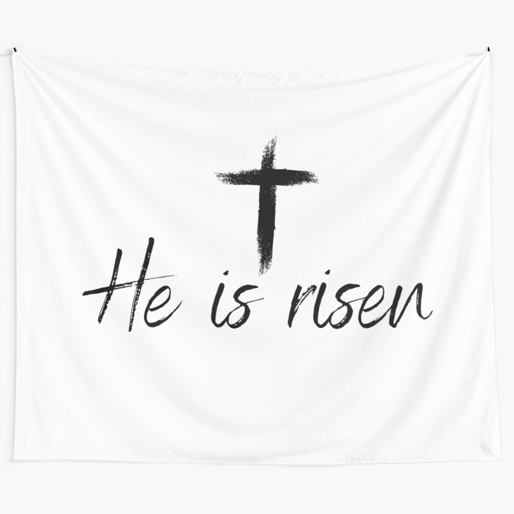 Christian Easter tapestry featuring a cross and the text "He is Risen"