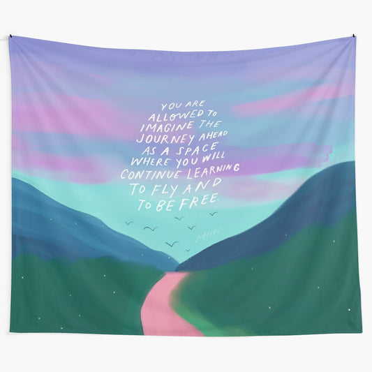 Vibrant tapestry with blue skies, mountains, and a winding path, featuring the quote "To Fly and Be Free"