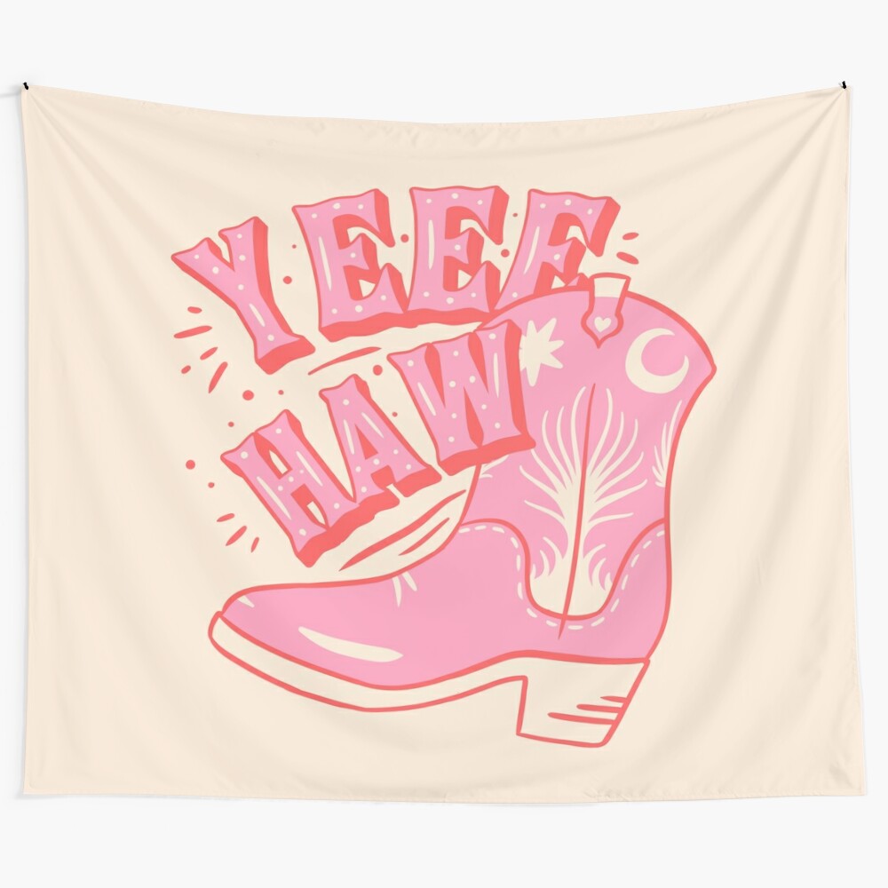 Pink and white tapestry with "Yeehaw" text, cowgirl boots, and space imagery on a white background