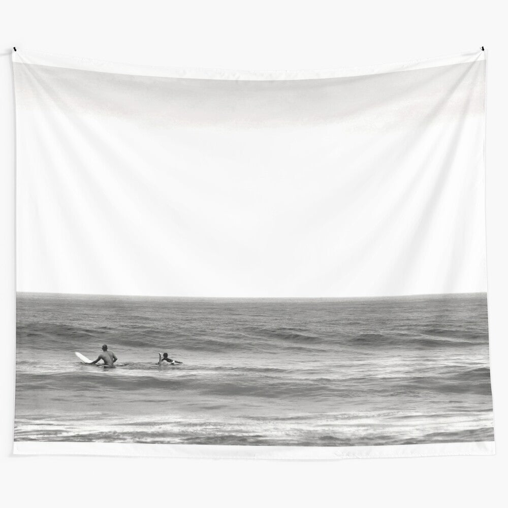 Waiting for waves tapestry featuring a father and son surfers in black and white