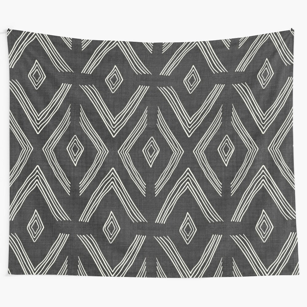 Black and white geometric tapestry with zig zag and diamond patterns